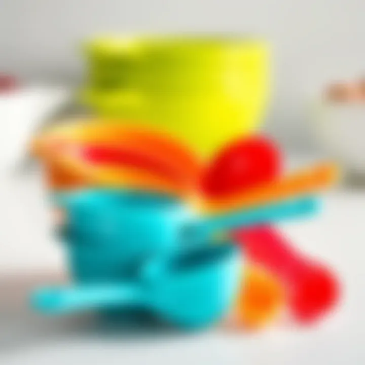 A set of measuring cups and spoons in bright colors arranged neatly