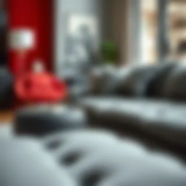 A close-up view of furniture pieces that embody the emotional impact of red, black, and grey.