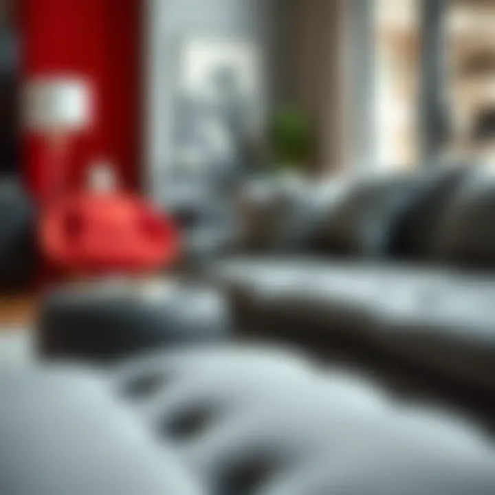 A close-up view of furniture pieces that embody the emotional impact of red, black, and grey.