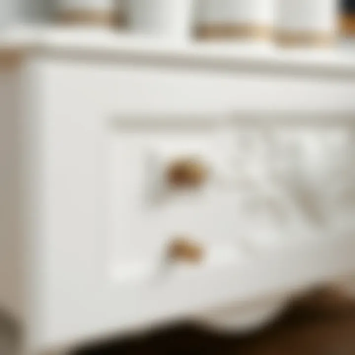 Close-up view of the intricate detailing on large white Chester drawers
