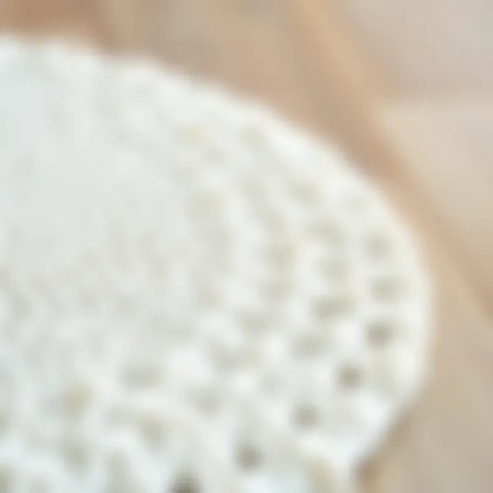 Close-up view of the texture of a white round rug