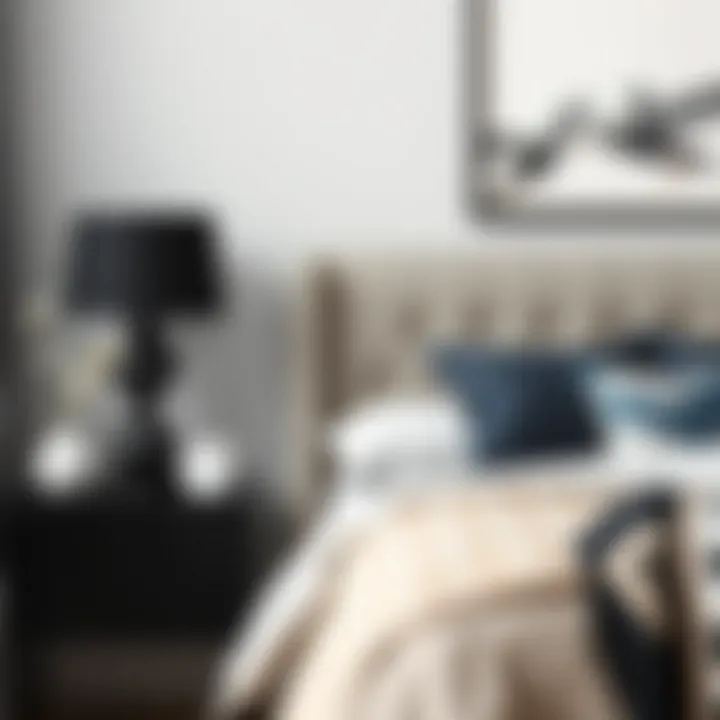 Stylish black side table paired with cozy bedding and artwork